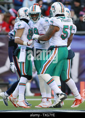 File:Miami Dolphins wide receiver Brandon Marshall of the American Football  Conference runs through the secondary