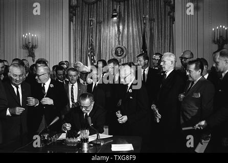 Lyndon Baines Johnson, referred to as LBJ, served as the 36th President of the United States from (1963-1969). Lyndon Johnson signing the Civil Rights Act, 2 July 1964. Martin Luther king Jr looks on the President Stock Photo