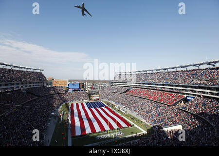 A United States Air Force C-5 Galaxy plane performs a fly over of Gillette Stadium before the New England Patriots take on the Buffalo Bills in Foxboro, Massachusetts on November 11, 2012.  UPI/Matthew Healey Stock Photo