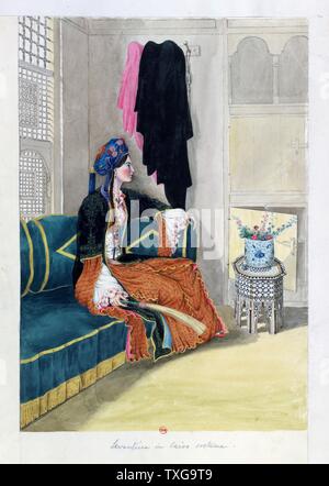 John Gardner Wilkinson British school Levantine in Cairo Costume - Profile of woman holding fly whisk seated on divan with back to window.  Watercolour Stock Photo