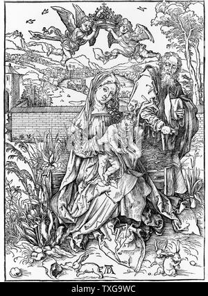 Albrecht Dürer German school The Virgin with child holding a book Woodcut Stock Photo