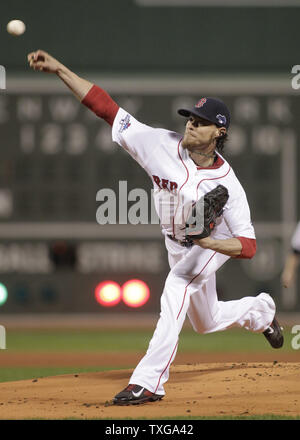 Boston Red Sox pitcher Clay Buchholz reacts after he surrendered a two ...