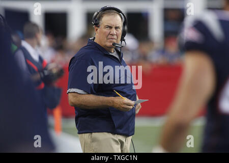 New England Patriots  head coach Bill Belichick stands on the sidelines before the start of the game against the Green Bay Packers at Gillette Stadium in Foxborough, Massachusetts on August 13, 2015.    Photo by Matthew Healey/ UPI Stock Photo