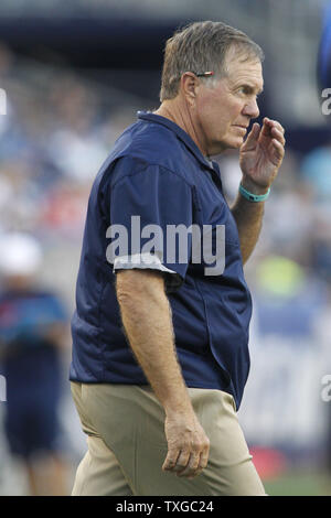 New England Patriots head coach Bill Belichick watches his team warm up before the preseason game against the Green Bay Packers at Gillette Stadium in Foxborough, Massachusetts on August 13, 2015.     Photo by Matthew Healey/ UPI Stock Photo