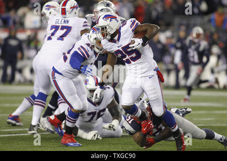 Buffalo Bills running back LeSean McCoy (25) is tripped up by New England Patriots linebacker Jerod Mayo (51) on a carry in the first quarter at Gillette Stadium in Foxborough, Massachusetts on November 23, 2015.     Photo by Matthew Healey/ UPI Stock Photo