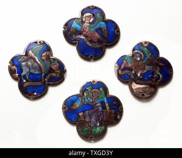 Symbols of the Four Evangelists. Created from engraved silver and translucent enamels. Dated 15th Century Stock Photo