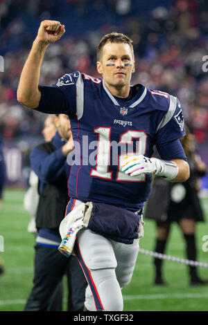 Patriots Quarterback Tom Brady pumps up the crowd about an hour