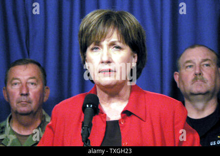 Louisiana Gov. Kathleen Blanco, backed by (L-R), General Arnceno, LA National Guard and Vice Adm. Thad Allen, Director of FEMA Field Operations, hold a joint press conference in Baton Rouge, LA on September 22, 2005 to warn residents of Lake Charles and southern Louisiana to evacuate before Hurricane Rita makes landfall.   (UPI Photo/James Terry III) Stock Photo