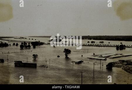 Photograph of The Great Mississippi River flood, at the Tent camp of refugees on river levee. Dated 1927 Stock Photo