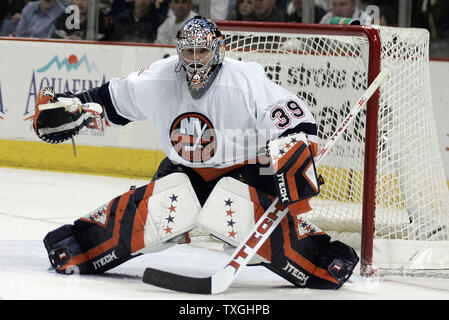 New York Islanders goalie Rick DiPietro guards the net in the second period against the Buffalo Sabres at the HSBC Arena in Buffalo, New York  on April 14, 2007.  The Islanders defeated Buffalo 3-2 to even the series, one game apiece. (UPI Photo/Jerome Davis) Stock Photo