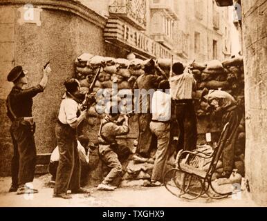 Spanish Republican barricade during the Siege of the Alcázar in Toledo in the opening stages of the Spanish Civil War. The Alcázar of Toledo was held by a variety of military forces in favour of the Nationalist uprising. Militias of the parties in the Popular Front began their siege on July 21, 1936. The siege ended on September 27 with the arrival of the Army of Africa under Francisco Franco Stock Photo