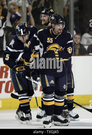 Buffalo Sabres' Jochen Hecht (55) of Germany reacts with teammate Mike Grier  (25) after his goal in the second period against the Carolina Hurricanes  during Game 7 of the NHL Eastern Conference