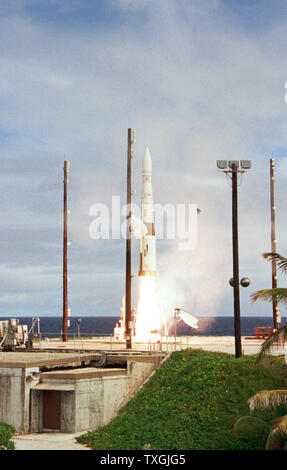 MCK2000011901 - 19 JANUARY 2000 - MECK ISLAND, MICRONESIA, USA:  A payload launch vehicle carrying a prototype interceptor is launched from Meck Island in the Kwajalein Missile Range on Jan. 18, 2000, for a planned intercept of a ballistic missile target over the central Pacific Ocean.  The target vehicle, a modified Minuteman intercontinental ballistic missile, was launched from Vandenberg Air Force Base, Calif., at 6:19 p.m., PST, and the vehicle carrying the prototype interceptor was launched about 20 minutes later.  The intercept was not achieved.  The test  was performed by the Ballistic Stock Photo