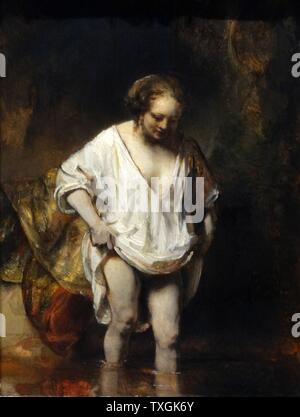 Painting titled 'A Woman bathing in a Stream' by  Rembrandt Harmenszoon van Rijn (1606-1669) a Dutch painter and etcher. Dated 17th Century Stock Photo