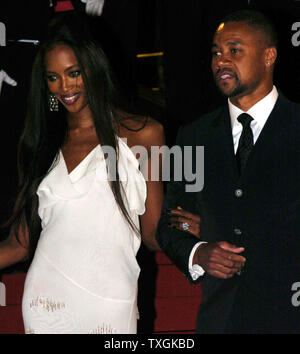 Naomi Campbell and Cuba Gooding Jr. pose for photographers before the gala screening of 'The Assassination of Richard Nixon' at the Palais des Festivals May 17, 2004 during the Cannes Film Festival in Cannes, France. (UPI Photo/Christine Chew) Stock Photo
