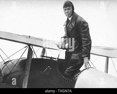 Charles Lindbergh (1902-1974) in his flying kit standing by 'Spirit of St Louis', the plane in which he made the first non-stop Atlantic air crossing: 20-21 May 1927. Landed at Le Bourget Airdrome, Paris, after a flight of 33.5 hours. Stock Photo