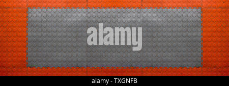 Rubber tile texture. Rubber pavement background. Abstract puzzle flooring pattern. Garage floor texture Stock Photo