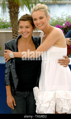 French actress Emma de Caunes (L) and Diane Kruger attend the photocall for 'L'Age des Tenebres' on the Terrasse Riviera at the 60th Cannes Film Festival in Cannes, France on May 26, 2007.  (UPI Photo/Christine Chew) Stock Photo