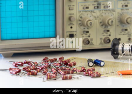 Electronic components with oscilloscope Stock Photo