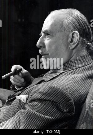 Thomas Beecham (1879-1961) English conductor and impresario. Beecham holding a cigar. Stock Photo