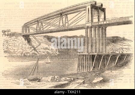 Wrought iron tubular trussed bridge over the river Wye at Chepstow, c1885.  This bridge, constructed 1849-1852, was an innovative design by Isambard Kingdom Brunel (1806-1859) and the use of wrought iron tubular girders is considered to be a dummy run for his last great masterpiece, the Royal Albert bridge over the Tamar at Saltash. The Chepstow bridge carried the South Wales Railway over the Wye. Brunel was engineer to the railway.   From 'The Popular Educator'. (London, c1885). Stock Photo