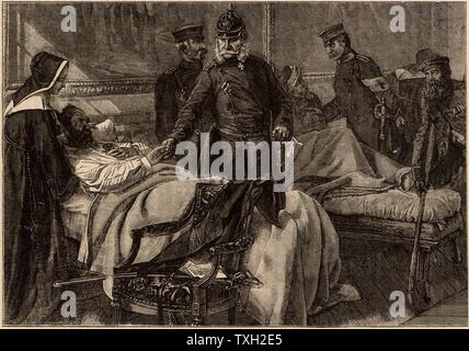 Franco-Prussian War 1870-1871: Wilhelm I (1797-1788) king of Prussia and first Emperor of Germany, visiting wounded German troops being nursed  in the Palace of Versailles. Wood engraving. Stock Photo