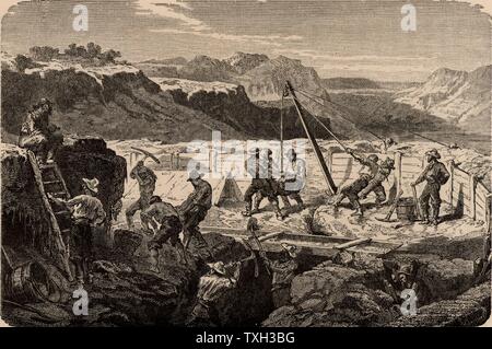Using a 'long tom' to wash for gold in the Californian gold fields.  The miners diverted the water courses, then dug out the ore-bearing sands which they washed for gold.  The Californian Gold Rush began in 1849.  From 'Underground Life; or, Mines and Miners' by Louis Simonin (London, 1869). Wood engraving.  Mining. Metal.  Gold. Stock Photo