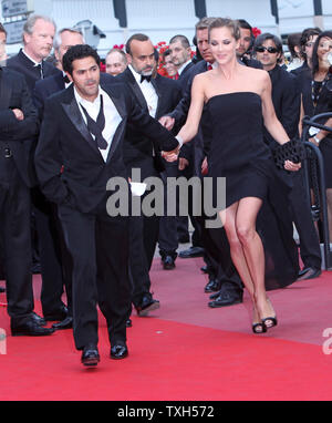 Jamel Debbouze and his wife Melissa Theuriau arrive on the red carpet before the screening of the film 'Hors La Loi (Outside of the Law)' during the 63rd annual Cannes International Film Festival in Cannes, France on May 21, 2010.  UPI/David Silpa Stock Photo