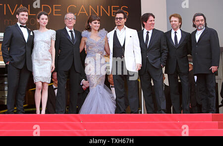 (From L to R) Sam Claflin, Astrid Berges-Frisbey, Geoffrey Rush, Penelope Cruz, Johnny Depp, Rob Marshall, Jerry Bruckheimer and Ian McShane arrive on the red carpet before the screening of the film 'Pirates Of The Caribbean: On Stranger Tides' during the 64th annual Cannes International Film Festival in Cannes, France on May 14, 2011.  UPI/David Silpa Stock Photo