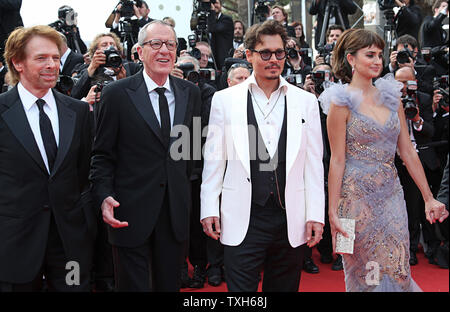 (From L to R) Jerry Bruckheimer, Geoffrey Rush, Johnny Depp and Penelope Cruz arrive on the red carpet before the screening of the film 'Pirates Of The Caribbean: On Stranger Tides' during the 64th annual Cannes International Film Festival in Cannes, France on May 14, 2011.  UPI/David Silpa Stock Photo