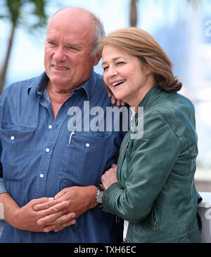 Peter Lindbergh (L) and Charlotte Rampling arrive at a photocall for the film 'The Look' during the 64th annual Cannes International Film Festival in Cannes, France on May 16, 2011.   UPI/David Silpa Stock Photo