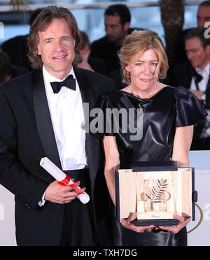 Bill Pohlad (L) and Dede Gardner arrive at the award photocall after receiving the 'Palme d'Or' top prize for the film 'The Tree of Life' during the 64th annual Cannes International Film Festival in Cannes, France on May 22, 2011.  Terrence Malick, who directed the film, was not present.   UPI/David Silpa Stock Photo