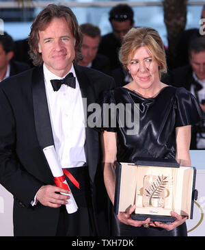 Bill Pohlad (L) and Dede Gardner arrive at the award photocall after receiving the 'Palme d'Or' top prize for the film 'The Tree of Life' during the 64th annual Cannes International Film Festival in Cannes, France on May 22, 2011.  Terrence Malick, who directed the film, was not present.   UPI/David Silpa Stock Photo