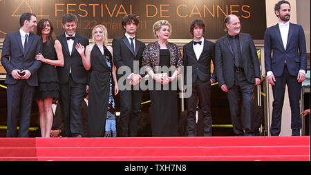 (From L to R) Paul Schneider, Chiara Mastroianni, Christophe Honore, Ludivine Sagnier, Louis Garrel, Catherine Deneuve, unidentified, Maxime Le Forestier and Rasha Bukvic arrive on the red carpet before the screening of the film 'Les Bien-Aimes' during the 64th annual Cannes International Film Festival in Cannes, France on May 22, 2011.  UPI/David Silpa Stock Photo