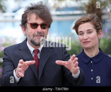 Jury President Nanni Moretti (L) and Emmanuelle Devos arrive at a jury photocall during the 65th annual Cannes International Film Festival in Cannes, France on May 16, 2012.   UPI/David Silpa Stock Photo