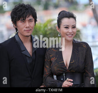 Qin Hao (L) and Hao Lei arrive at a photocall for the film 'Mystery' during the 65th annual Cannes International Film Festival in Cannes, France on May 17, 2012.   UPI/David Silpa Stock Photo