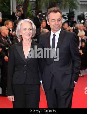 Michel Denisot (R) and his wife Martine Patier arrive on the red carpet before the screening of the film 'Therese Desqueyroux' during the closing ceremony of the 65th annual Cannes International Film Festival in Cannes, France on May 27, 2012.  UPI/David Silpa Stock Photo