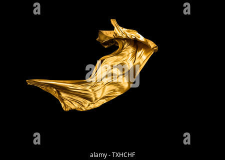 golden soft satin flying in wind on background Stock Photo