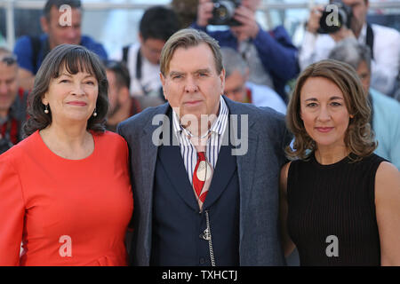 Marion Bailey (L), Timothy Spall (C) and Dorothy Atkinson arrive at a photo call for the film 'Mr. Turner' during the 67th annual Cannes International Film Festival in Cannes, France on May 15, 2014.   UPI/David Silpa Stock Photo