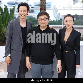 Nam Gil Kim L Seung Uk Oh C And Do Yeon Jeon Arrive At A Photocall For The Film Mu Roe Han The Shameless During The 68th Annual Cannes International Film Festival In Cannes France On May