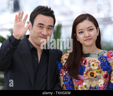 Sung-Woo Bae (L) and Ah-Sung Ko arrive at a photocall for the film 'O Piseu (Office)' during the 68th annual Cannes International Film Festival in Cannes, France on May 19, 2015.   Photo by David Silpa/UPI Stock Photo