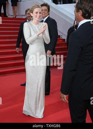 Emily Blunt, with Josh Brolin, Benicio Del Toro and Denis Villeneuve, arrives on the red carpet before the screening of the film 'Sicario (Hitman)' during the 68th annual Cannes International Film Festival in Cannes, France on May 19, 2015.  Photo by David Silpa/UPI Stock Photo