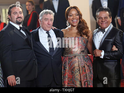 (From L to R) Jonathan Jakubowicz, Robert De Niro, Grace Hightower and Roberto Duran arrive on the steps of the Palais des Festivals before the screening of the film 'Hands of Stone' during the 69th annual Cannes International Film Festival in Cannes, France on May 16, 2016.  Photo by David Silpa/UPI. Stock Photo