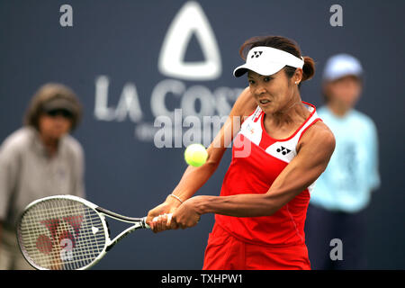 Saori Obata of Japan returns a backhand to Gisela Dulko of Argentina in first day tournament play at Acura Classic women's tennis, Carlsbad, California on August 1, 2005.  Major seeded players Maria Sharapova and Serena Williams have withdrawn due to injuries. While Lindsay Davenport and Kim Clijsters begin competing this week with finals on August 7, 2005. (UPI Photo/Tom Theobald) Stock Photo