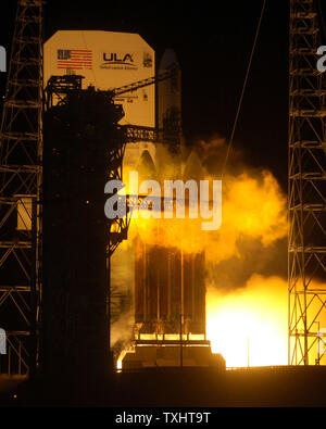 Flames engulf a Boeing Delta IV 'Heavy' rocket at ignition at 9:47 PM on launch pad 37B at the Cape Canaveral Air Force Station, Florida on January 17, 2009. International Launch Services conducted the launch of a classified payload for the US National Reconnaissance Office (NRO). The Delta IV 'Heavy' is the largest rocket in the USAF Evolved Expendable Booster Program replacing the Titan IV vehicle which was retired in 2005. (UPI Photo/Joe Marino-Bill Cantrell) Stock Photo