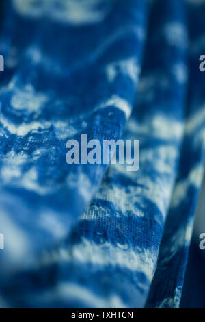 Batik braid glowing dots abstract background Stock Photo