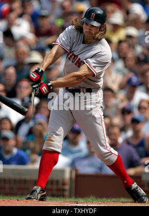 Boston Red Sox's Johnny Damon (18) breaks his bat singling