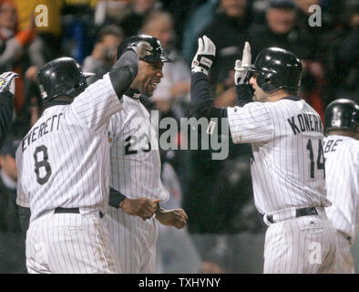 Chicago White Sox's Paul Konerko pumps his fist after hitting a grand slam  scoring Jermaine Dye, Tadahito Iguchi and Juan Uribe during the seventh  inning of game 2 of the World Series