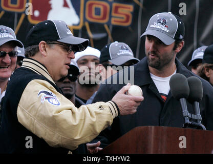 Chicago White Sox manager Ozzie Guillen, left, gets his 2005 World Series  Championship ring from chairman Jerry Reinsdorf before the game against the  Cleveland Indians on April 4, 2006, in Chicago. (UPI