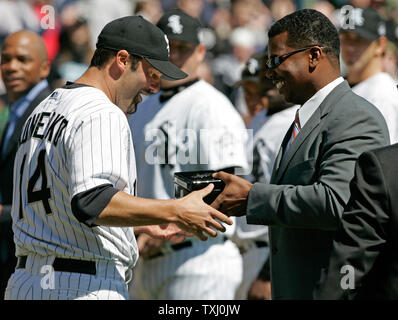 Cleveland Indians outfielder Kenny Lofton, left, talks with hitting coach  Derek Shelton before the Indians' baseball game against the Minnesota  Twins, Friday, July 27, 2007, in Cleveland. Lofton was traded from the